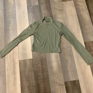 Turtleneck green long sleeved shirt